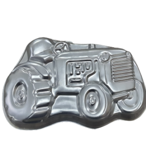 Aluminum cake mold shaped like a tractor (Alu is likely short for aluminum)