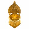 Miniature brass Kamatchi vilakku (lamp) with intricate traditional design, polished to a shine.