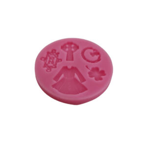 Gum paste mold shaped like an elegant dress, perfect for cake decorating.