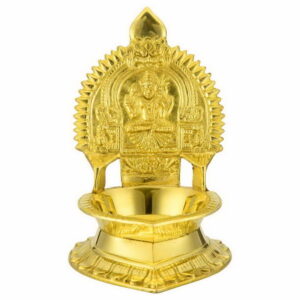 A medium-sized brass Kamatchi vilakku (lamp) with intricate traditional design, polished to a shine.