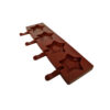 Silicone lollipop chocolate mold with multiple cavities for shaping chocolate lollipops.