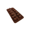 Silicone chocolate mold with chess piece-shaped cavities for creating chocolate chess pieces.