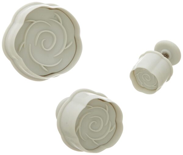 Plunger cutter in the shape of a rose, used for fondant decoration.