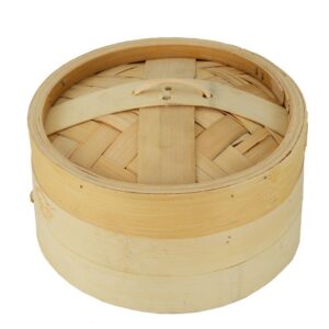 Large bamboo steamer basket with lid, traditional Asian cooking utensil.