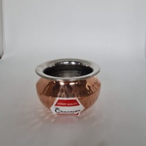 Small steel and copper Punjabi serving handi, traditional Indian cookware.