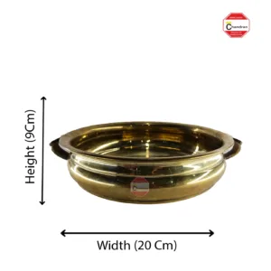 Traditional Indian brass urli for cooking (adds functionality and material)