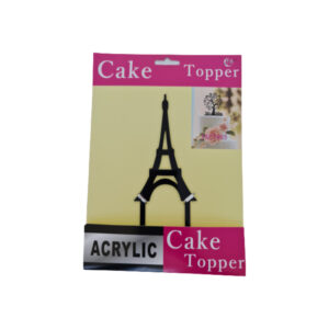 Tower-shaped cake topper with sparkling decorations.