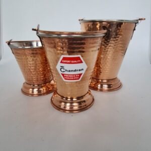 Large copper serving bucket, ideal for beverages or decorative purposes.