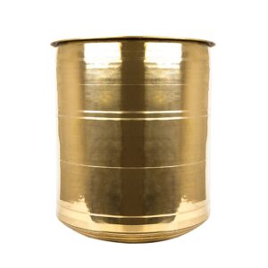 A traditional brass Anda Plain, used for cooking and serving Indian cuisine.