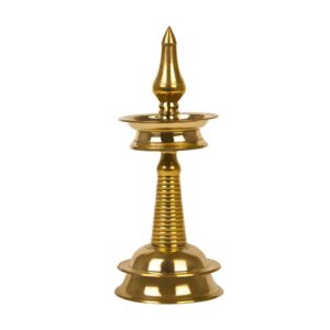 A traditional Brass Kerala Vilakku (lamp) used in South Indian households for religious and decorative purposes.