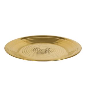 A traditional brass Parath, used for kneading dough or serving food.