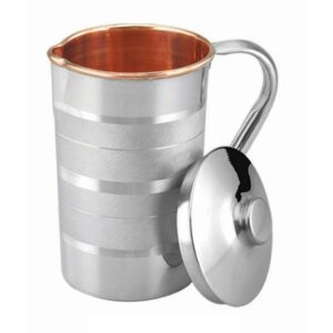 A traditional copper water jug, gleaming with a polished finish.